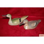 Two painted wooden decoy ducks