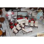 A quantity of dolls house furniture to include uph
