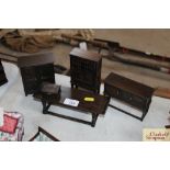 Five pieces of Norman Jones dolls house furniture