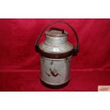 A metalware milk churn with swing handle, 20" high overall