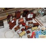 A quantity of dolls house furniture to include a g