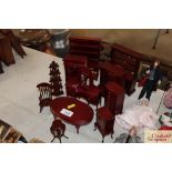 A quantity of dolls house furniture to include ova