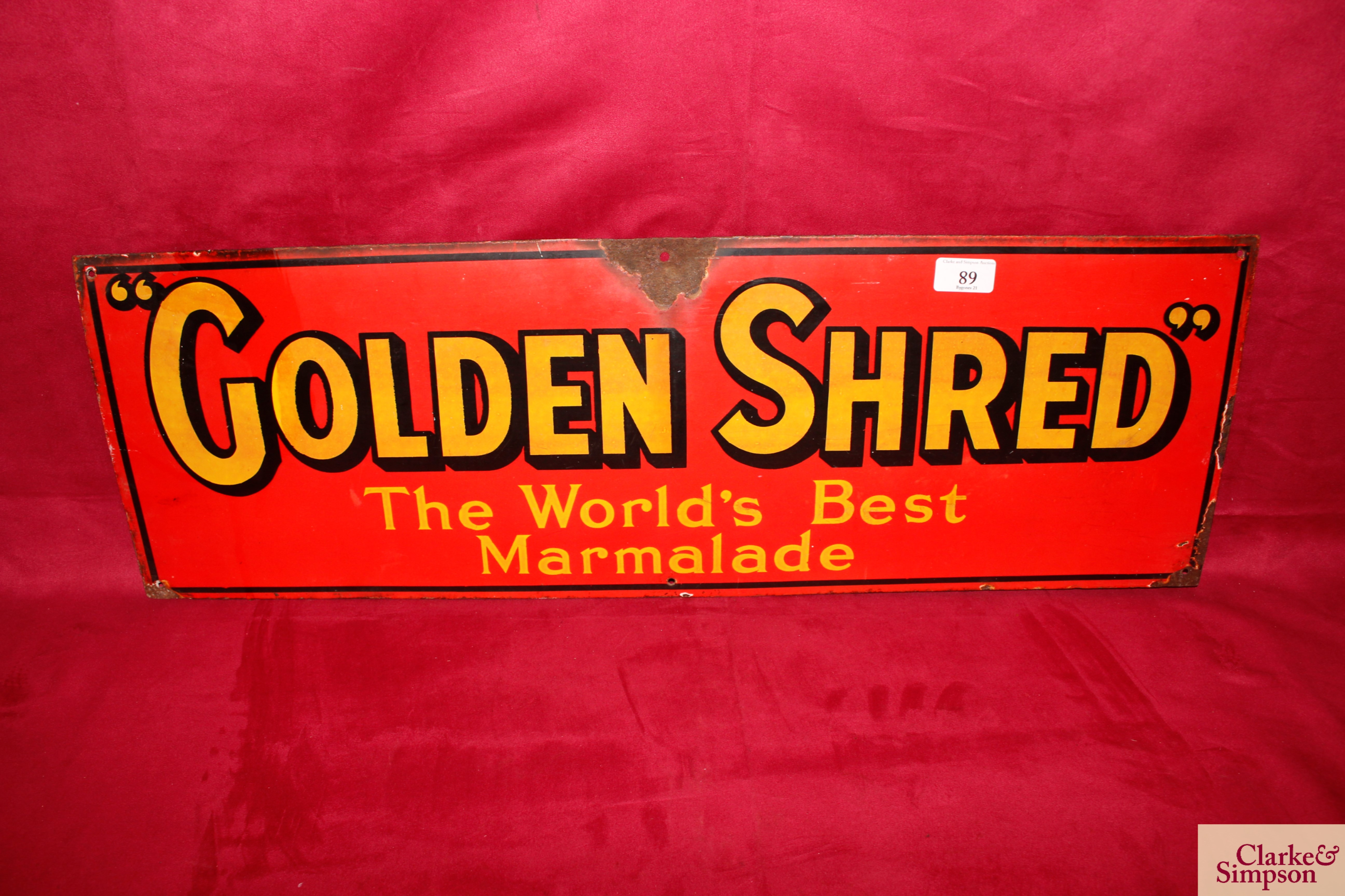 An enamel advertising sign for "Golden Shred, The