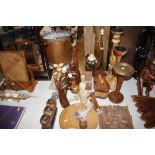A collection of wooden items to include candle sta