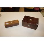 A Victorian rosewood box with removable tray; and