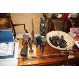 A collection of various ebony and other ethnic fig