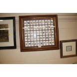A framed collection of Players cigarette cards