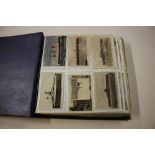 A post-card album containing approx. 400 cards
