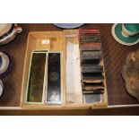 A collection of Magic Lantern slides in box