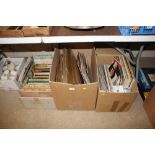 Two boxes containing various pictures and prints etc