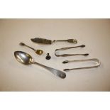 Two pairs of silver sugar tongs; a silver butter k