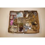 A box containing miscellaneous vintage tiny beads,