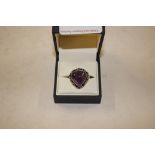 A boxed silver marked 925 amethyst ring