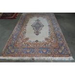 An approx. 9' x 6' floral patterned rug