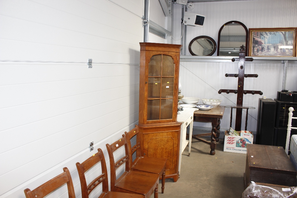 A walnut display cabinet