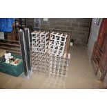 Four wooden and metal wine racks