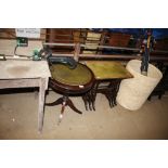 A reproduction mahogany leather topped drum table;