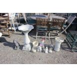 A quantity of various concrete garden ornaments to