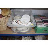 A box of various commemorative and crested china