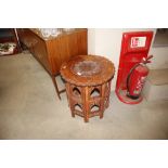 A brass inlaid Eastern table