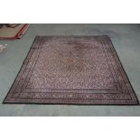 An approx. 6' x 6' Eastern patterned rug AF