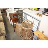 Two log baskets; a wicker laundry basket; and a br