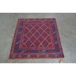 An approx. 4' x 3'9" Gazak rug