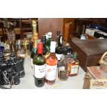 A quantity of various wine and spirits, some opene