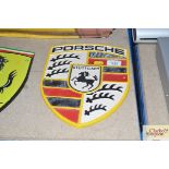 A cast iron Porsche sign