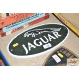 A cast iron Jaguar sign