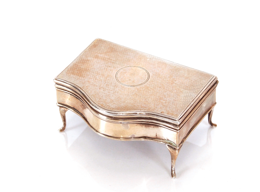 A small George V silver trinket box, in the shape of a table cabinet by Mappin & Webb, Birmingham
