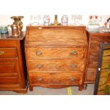 A Georgian mahogany bureau, the fall front opening to reveal an interior of drawers and pigeon