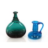An early Persian green glass bottle, with serpent coiled decoration, 23cm high; and a Persian blue