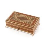 A Middle Eastern micro mosaic inlaid jewellery box, having stellar and bone ornament, 25cm wide