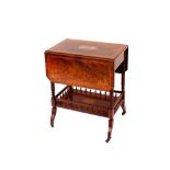 An Edwardian rosewood and inlaid two tier drop leaf tea trolley, raised on turned columns above an