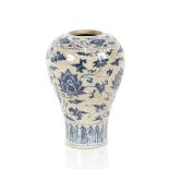A Ming Dynasty Chinese blue and white porcelain vase, of Mei Ping shape with floral decoration