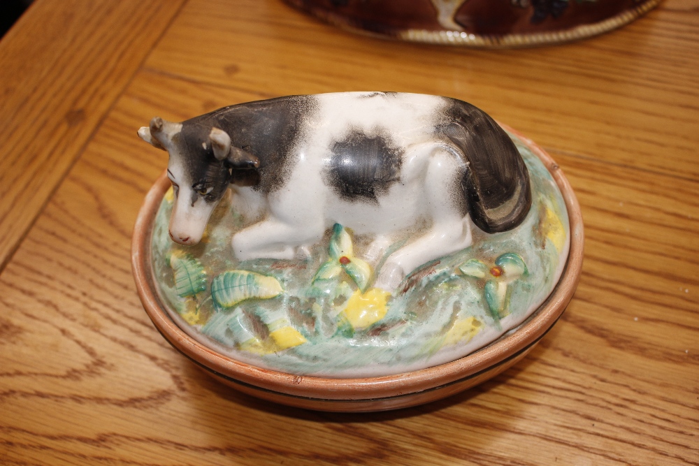 A Minton Majolica game pie dish and cover, decorated gun dog and shooting apparel to the lid, the - Image 4 of 32