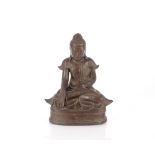 An antique bronze seated figure of Buddha, 22cm high