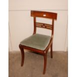 A set of six Regency mahogany brass inlaid dining chairs, having ball and rail backs, loose swab