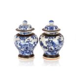 A pair of 19th Century Chinese crackle glaze baluster vases, profusely decorated birds and