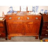 A 19th Century mahogany serving cabinet, fitted with two short drawers above a pull out slide,