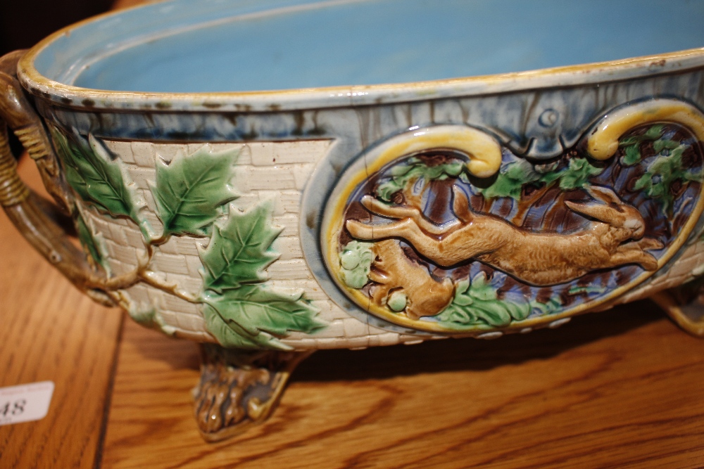 A Minton Majolica game pie dish and cover, decorated gun dog and shooting apparel to the lid, the - Image 26 of 32