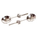 A pair of late 19th Century hand made Chinese silver spoons, fashioned as lilies, seal marks and