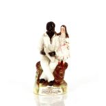 A Victorian Staffordshire figure group, "Uncle Tom and Eva", 18cm