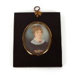 A 19th Century portrait miniature, of Mrs Anne Fawcett wearing dark dress with lace trimmed collar