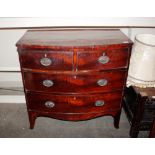 A 19th Century mahogany bow front chest, two short over two long drawers, raised on a shaped apron