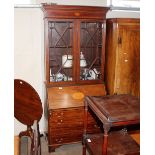 An Edwardian inlaid mahogany bureau bookcase, the upper adjustable shelves enclosed by a pair of