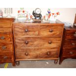 A 19th Century mahogany chest, fitted two short and two long drawers, raised on turned supports,