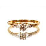 An 18ct gold and platinum solitaire diamond ring, 2.5gms total weight