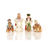 Three Victorian porcelain nodding figures; and a seated China man figure with waving hand (4)